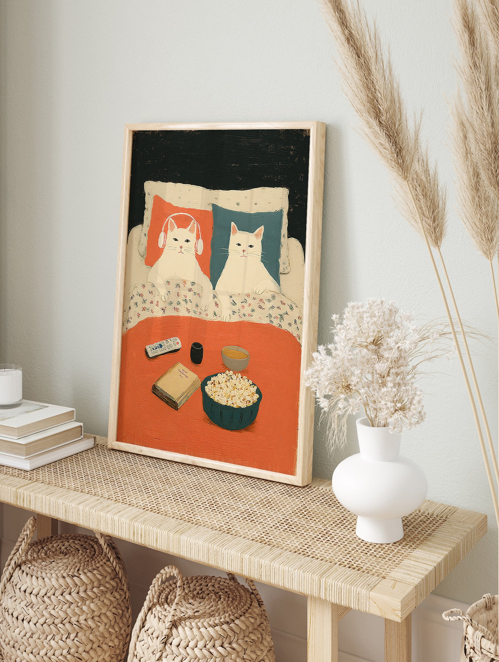 Illustration of two white cats relaxing in bed with popcorn, a book, and remote. One cat wears headphones. Cozy cat art print. - Image 3