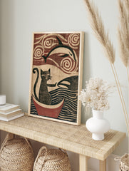 Woodblock style art print of a cat in a boat reaching for a dolphin with swirling sky and, in an alternate framed mockup