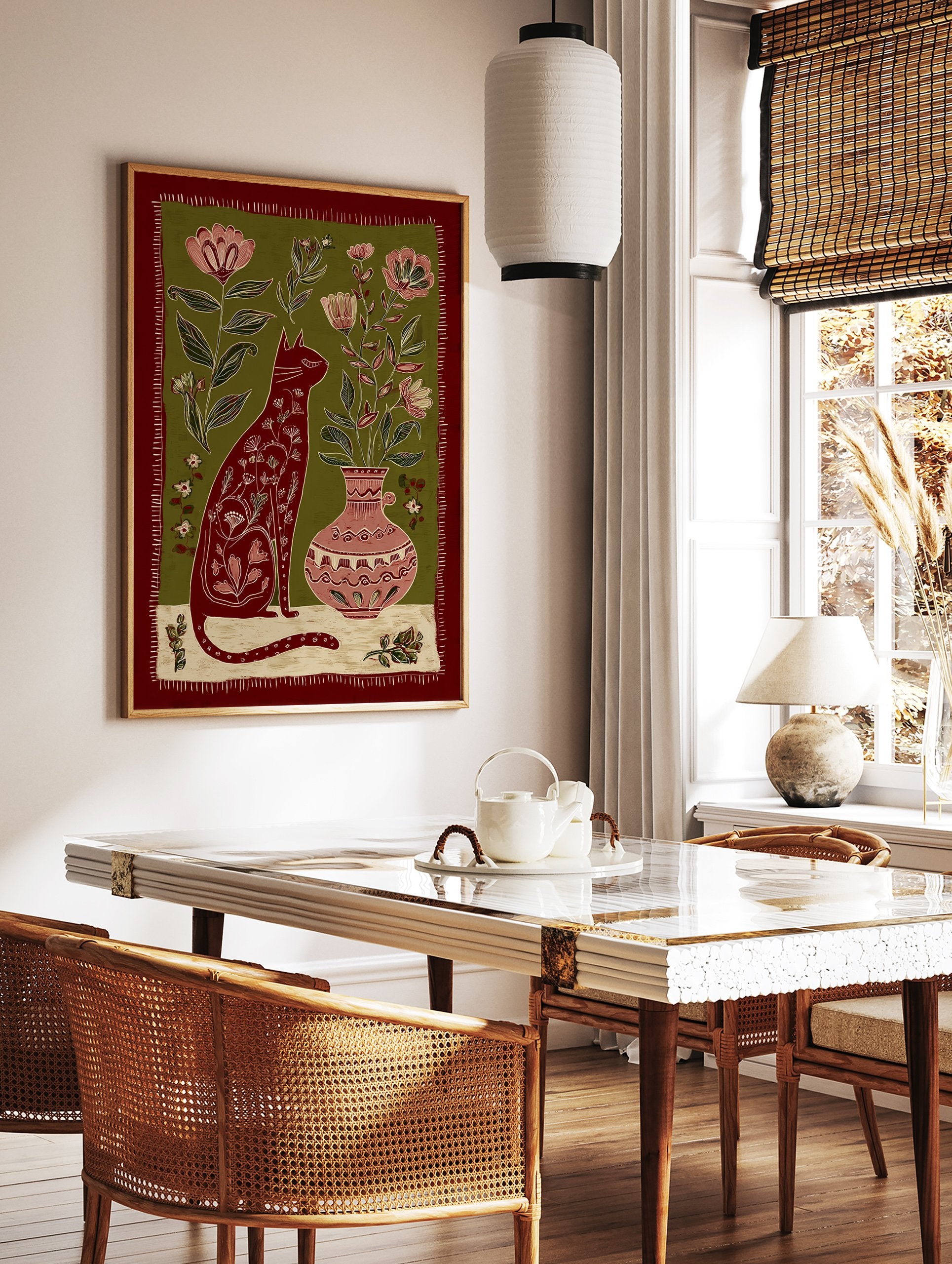Folk art illustration of a red cat with floral patterns, sitting next to a vase with pink flowers on a green background. - Image 2