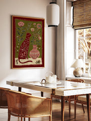 Folk art illustration of a red cat with floral patterns, sitting next to a vase with pink flowers on a green background. - Image 2