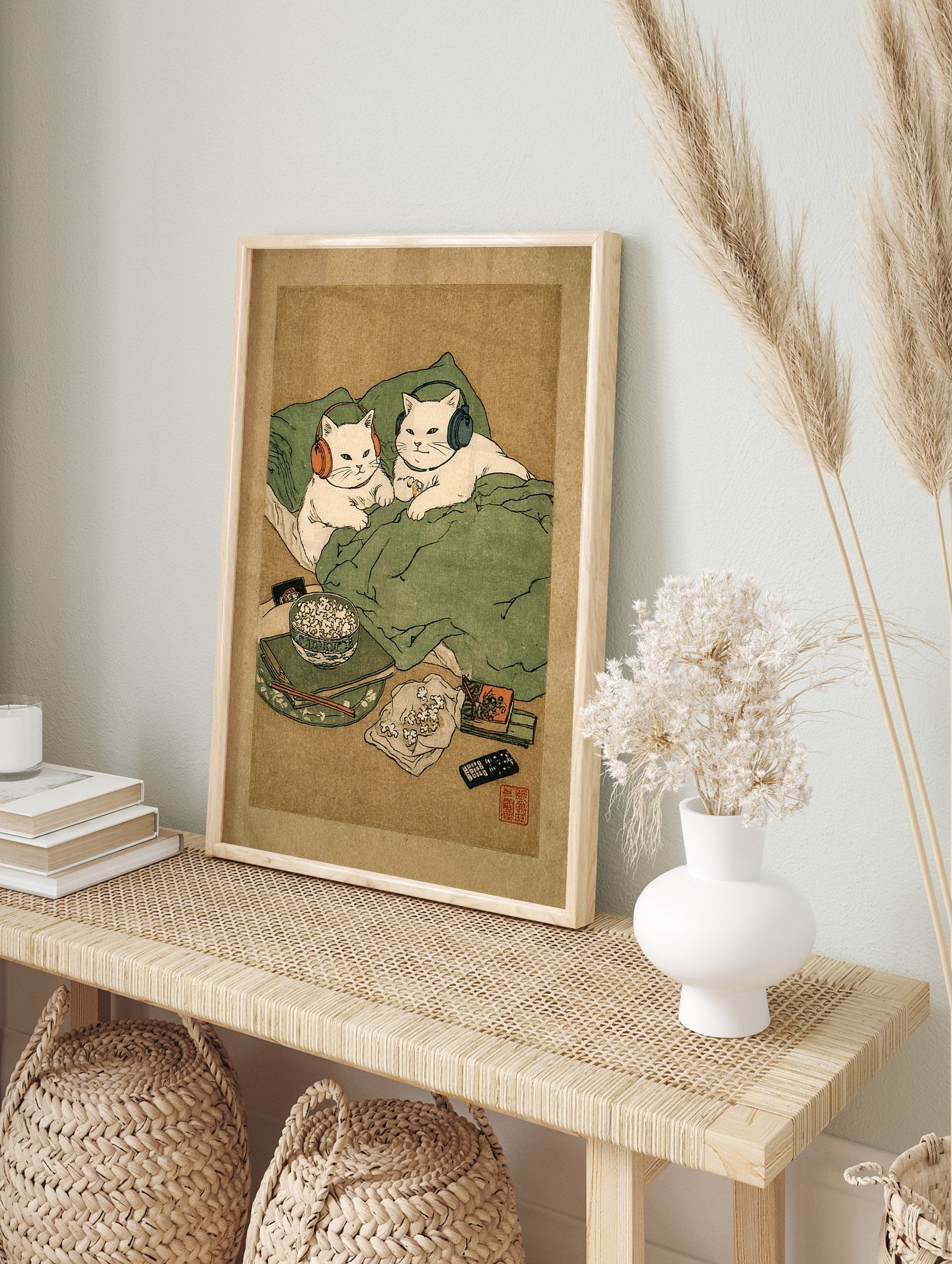 Japanese-style cat wall art showing two white cats with headphones in bed, surrounded by popcorn and a remote. - Image 3