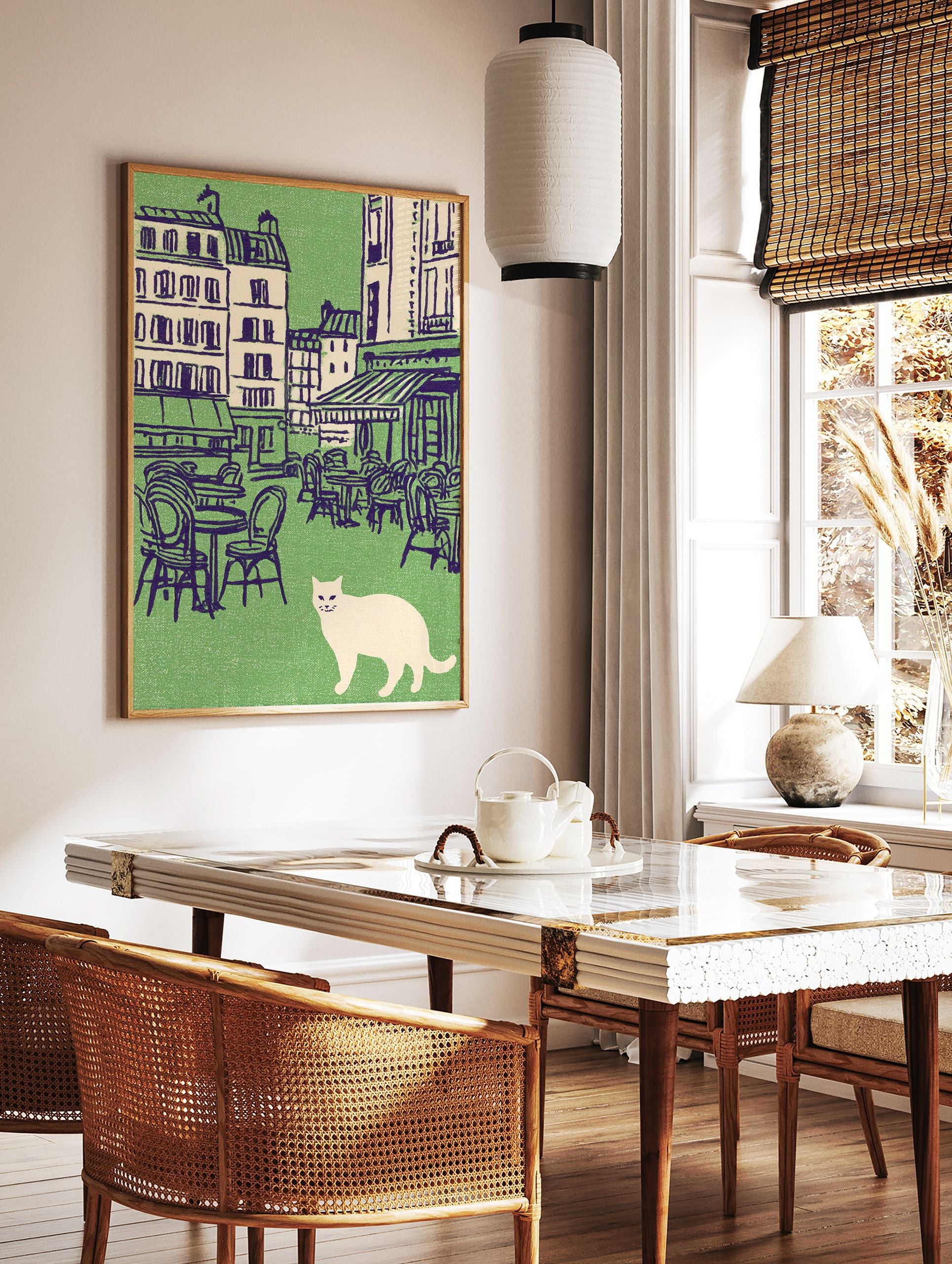 Vintage illustration of a white cat in front of a green Parisian cafe scene with outdoor tables and buildings. Cat wall art. - Image 2