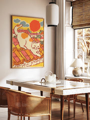 Vintage style illustration of a white cat with orange spots stretching on a terracotta tiled rooftop under a red sun, blue clouds. Cat Wall Art. - Image 2