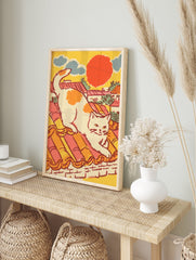 Vintage style illustration of a white cat with orange spots stretching on a terracotta tiled rooftop under a red sun, blue clouds. Cat Wall Art. - Image 3
