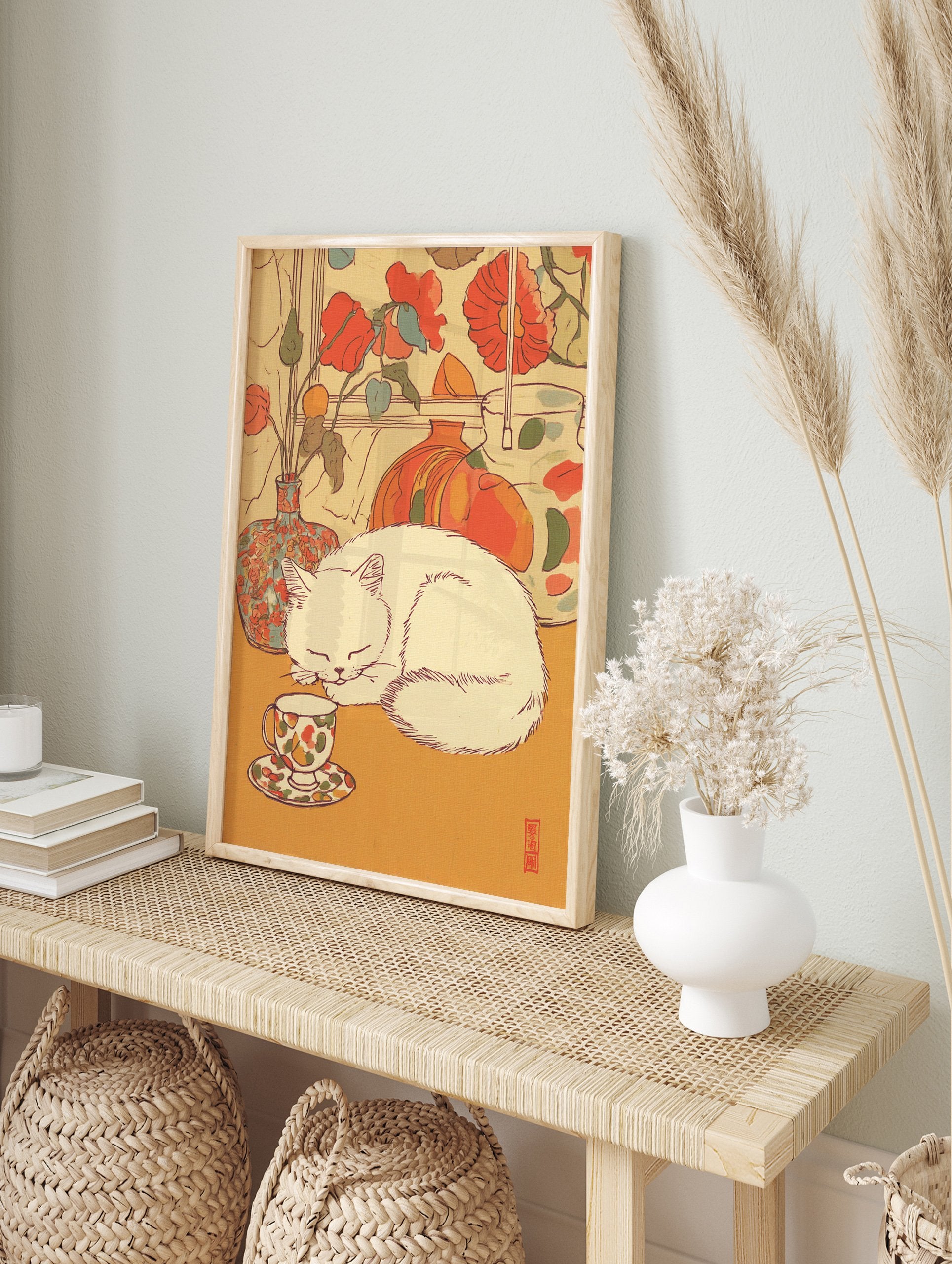 Illustrative Cat Wall Art of a white cat sleeping next to a floral teacup and vases with red flowers. - Image 3