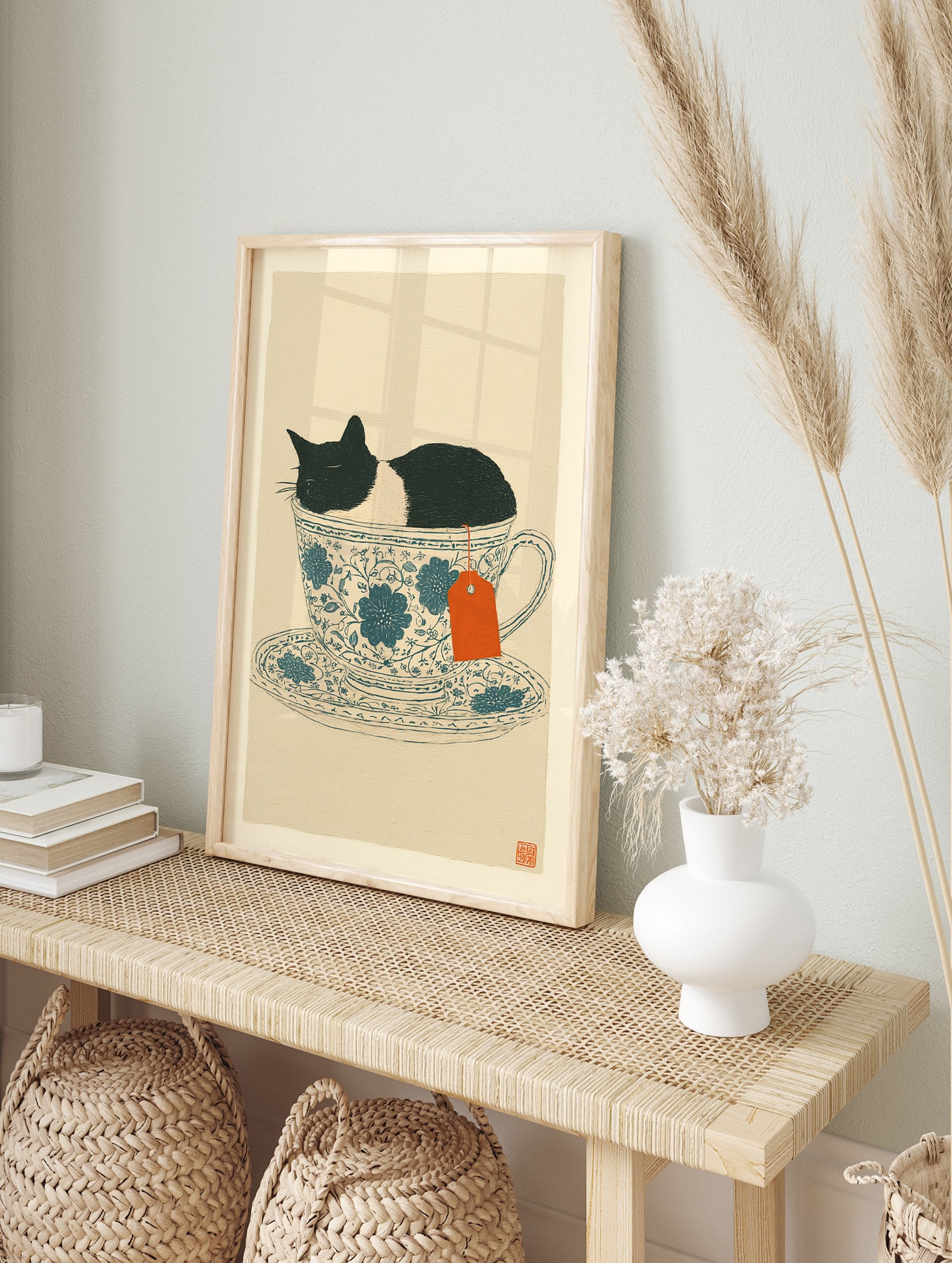 Whimsical cat wall art print featuring a black and white cat sleeping in a blue floral teacup with an orange tea tag. - Image 3