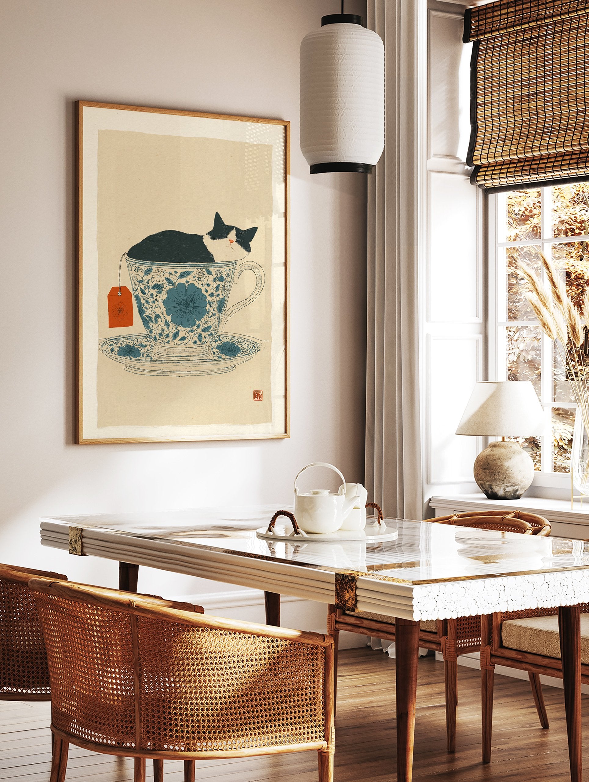 Black and white cat sleeping in a blue floral teacup with an orange tea tag, whimsical cat wall art print. - Image 2
