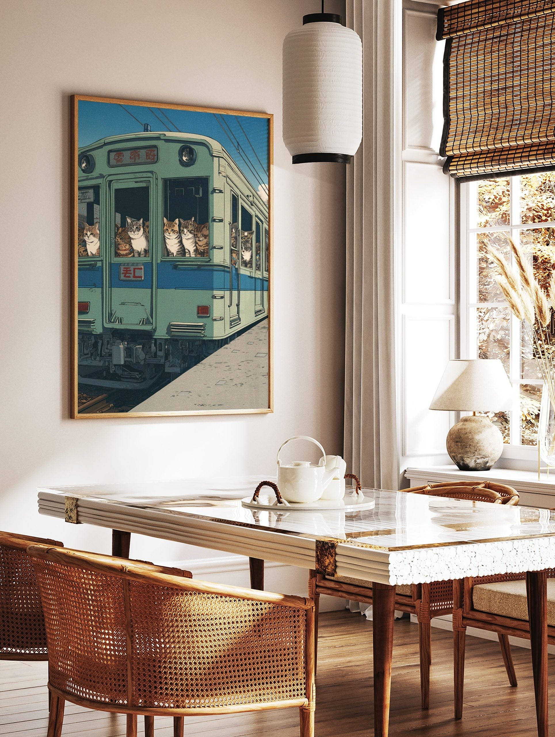 Illustrative art print of various cats looking out of the windows of a green Japanese train under a, in a styled room mockup