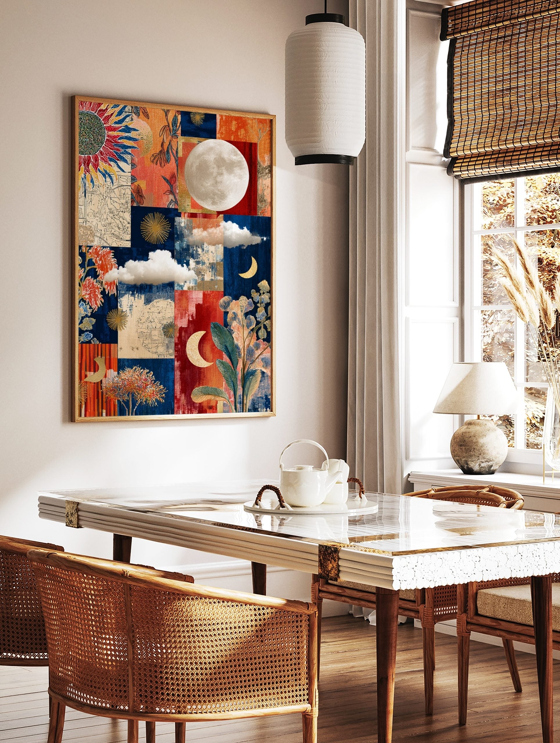 Collage wall art with full moon, crescent moons, sunflower, plants, and map fragments on blue and, in a styled room mockup
