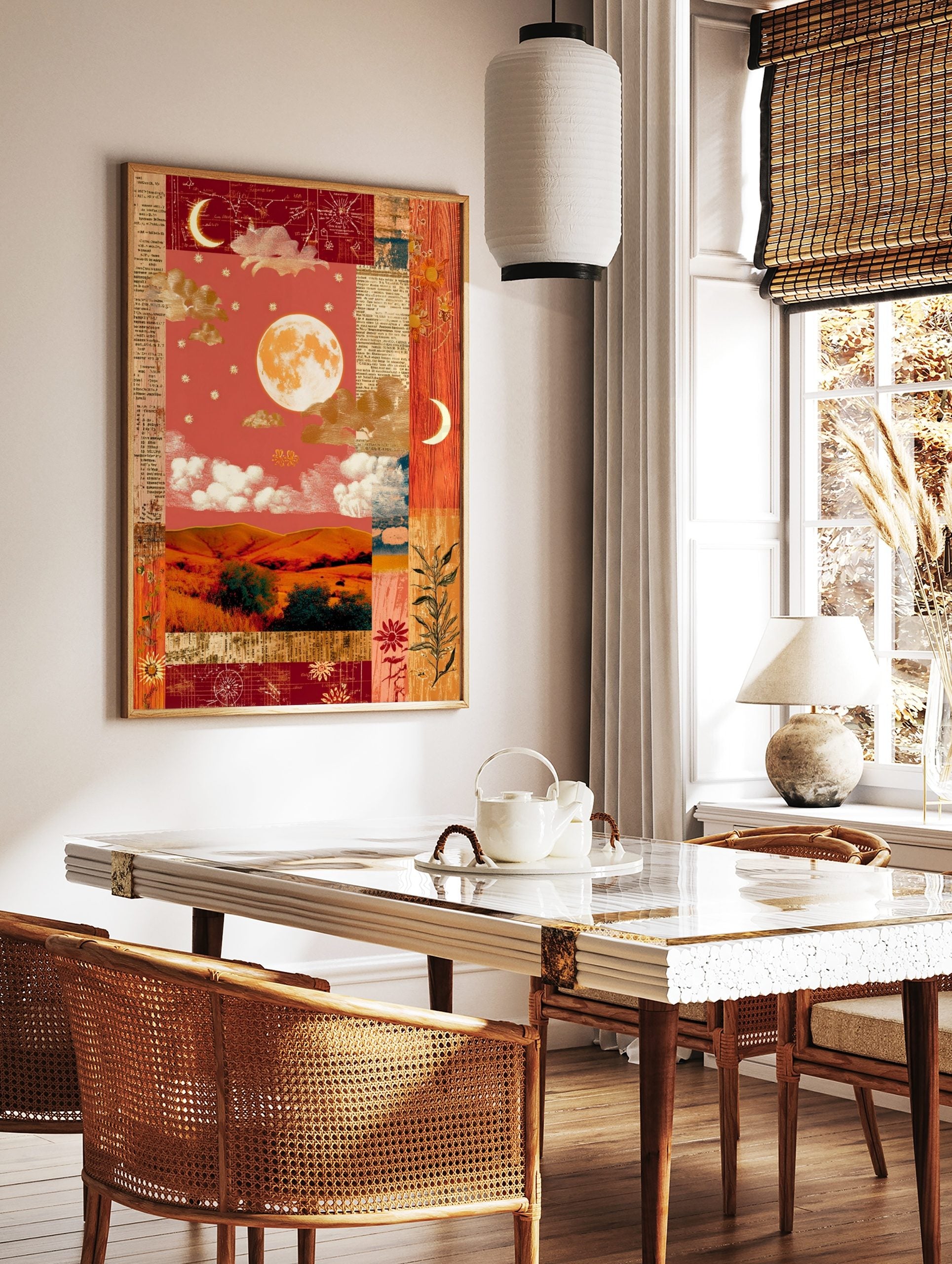 Vintage collage wall art with full moon, crescent moons, golden clouds, red sky, and rolling hills, in a styled room mockup