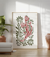 Red and green illustrated chameleon art print surrounded by green foliage on a white background, nature decor. - Image 3