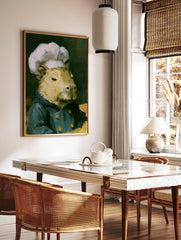 Painterly capybara portrait wearing a white chef hat and blue jacket, animal wall art print, in a styled room mockup