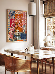 Illustrative cherry blossom tree with pink flowers, stone lantern, pond, and blue & red patterned, in a styled room mockup