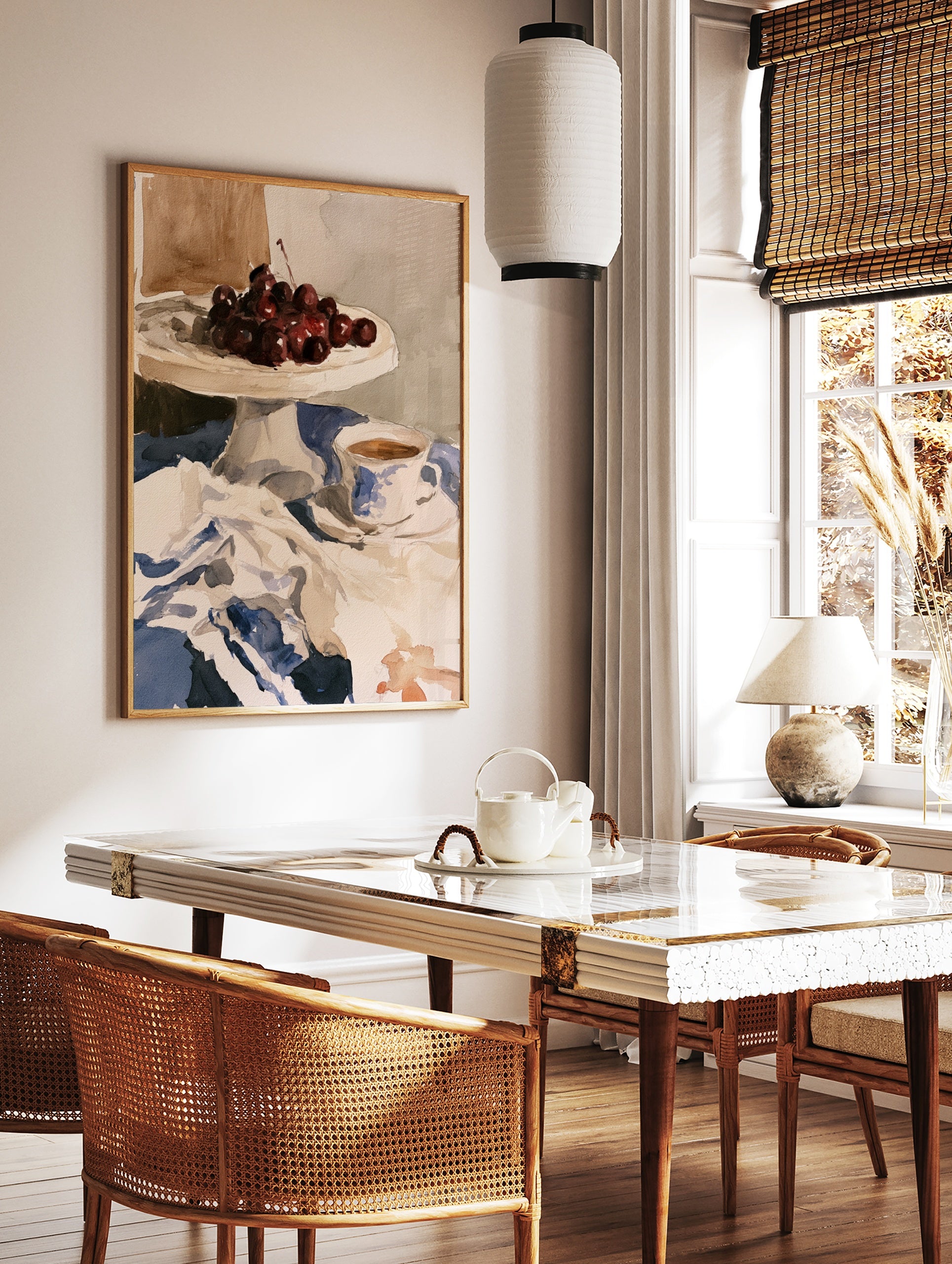 Watercolour still life print of cherries on a cake stand and a teacup on a blue tablecloth, in a styled room mockup