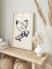 Monochrome illustration of a chicken riding a grey skateboard on a cream background. Quirky chicken skateboard wall art. - Image 3