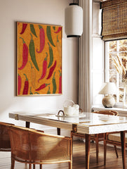 Colorful chili pepper wall art print featuring red, green, and yellow peppers with folk art patterns on an orange background. - Image 2