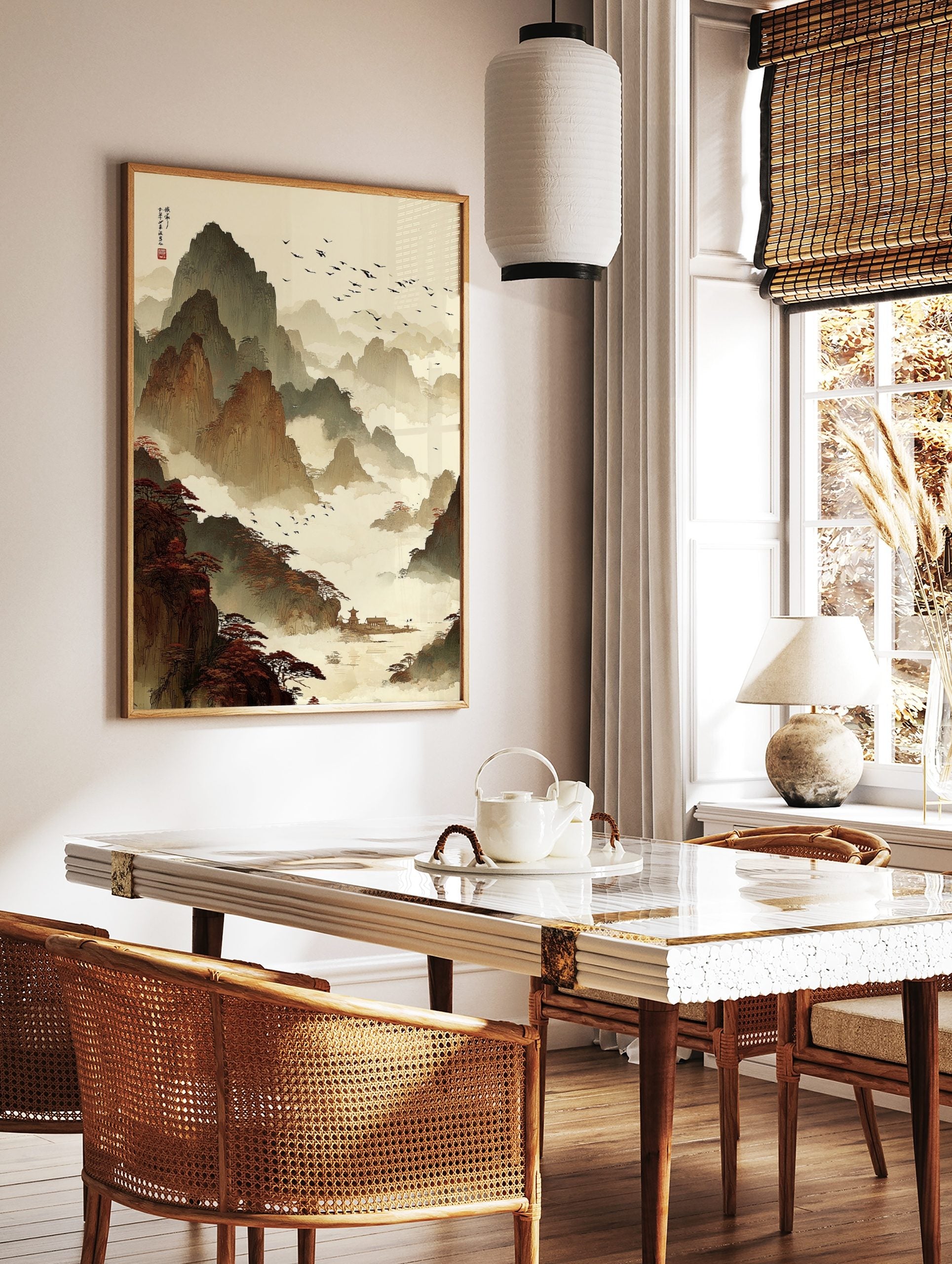 Traditional Chinese ink wash painting of layered mountains, misty clouds, flying birds, red trees, in a styled room mockup