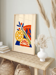 Citrus fruit illustration with orange slices, red berries, and green stems on a blue and, in an alternate framed mockup