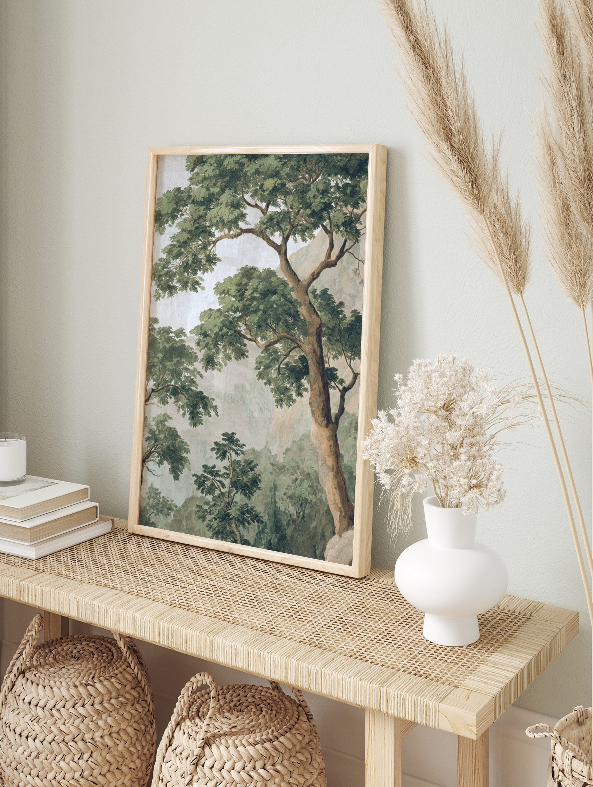 Classic illustrative tree landscape print with dense green foliage, brown trunks, and hazy, in an alternate framed mockup