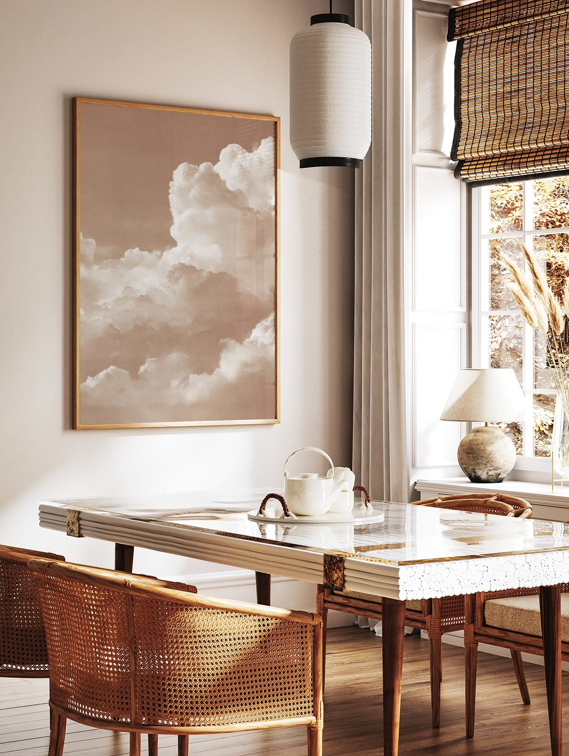 Sepia tone photo of fluffy cumulus clouds filling the sky, creating an abstract and peaceful nature, in a styled room mockup