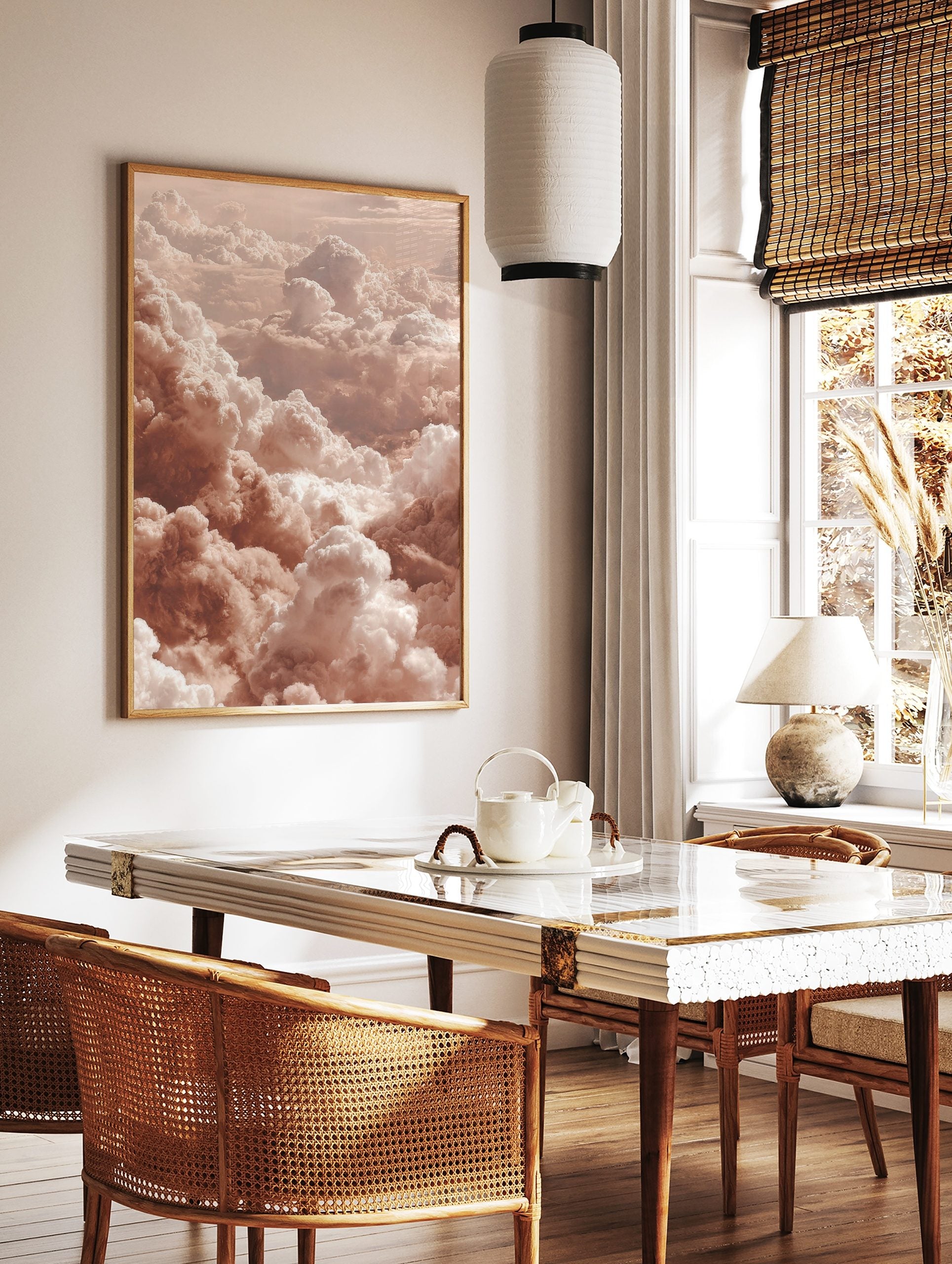 Aerial view of fluffy cumulus clouds in warm peach and white earth tones, filling the frame, in a styled room mockup