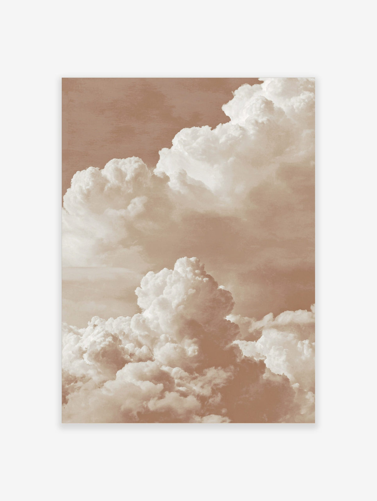 Warm sepia-toned photographic print of large, layered cumulus clouds against a soft sky