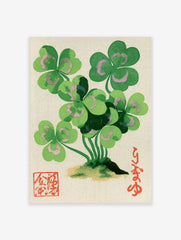 Clover botanical illustration with green leaves and pink accents, Japanese calligraphy, and red seal on off-white paper