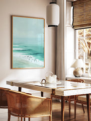 Modern coastal beach poster showing a serene ocean scene with teal waves, sand, and small figures of surfers. - Image 2
