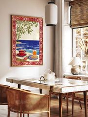 Illustrative coastal breakfast scene with coffee, croissant, orange juice, blue sea, green leaves, in a styled room mockup