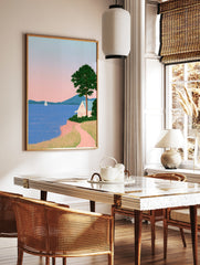 Minimalist coastal landscape art print featuring a white house on a cliff, a sailboat, mountains, in a styled room mockup
