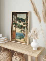 Coastal landscape wall art showing an ocean view with a large pine tree through a rustic wooden window frame. - Image 3