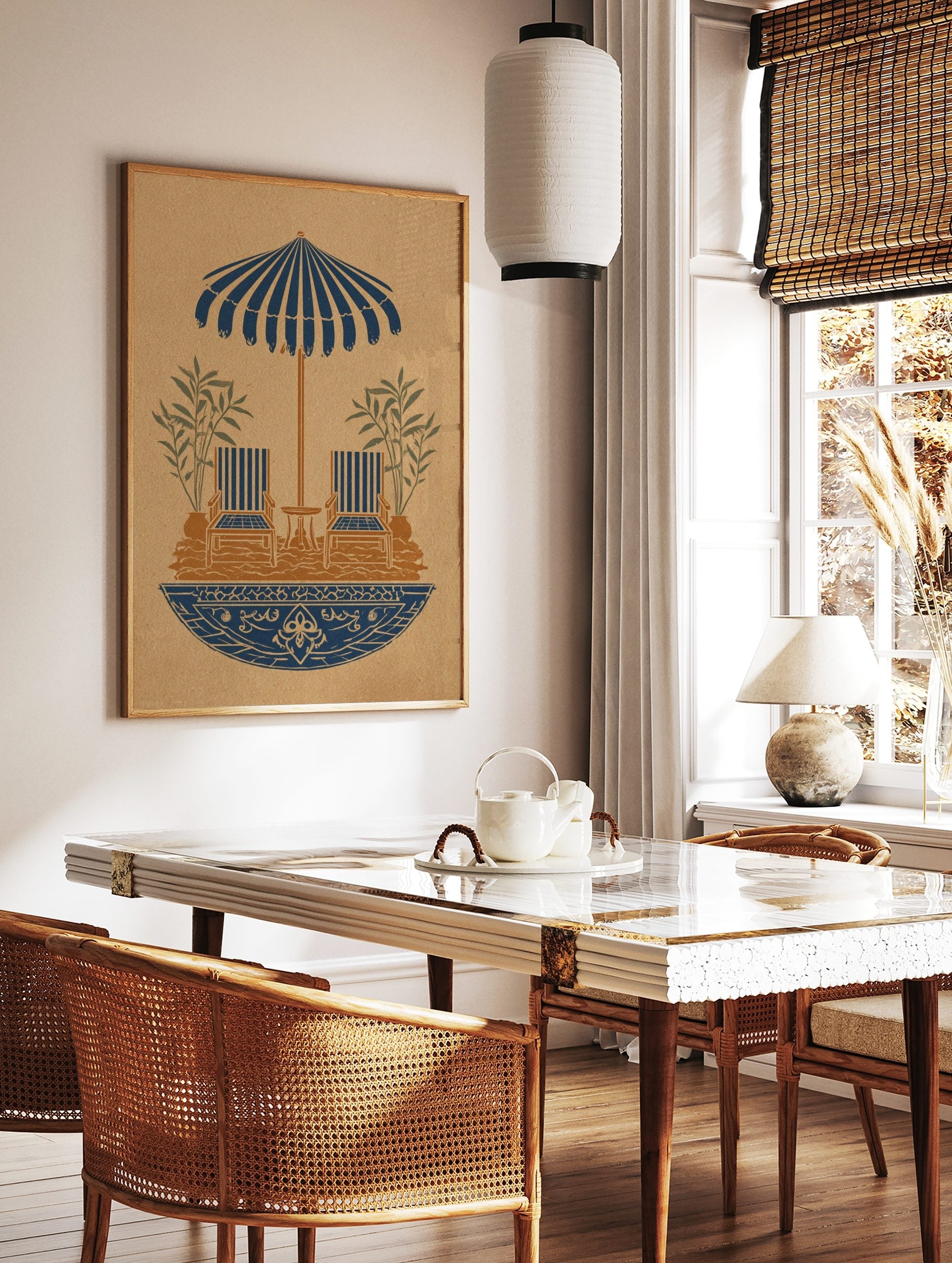 Illustrative print of striped parasol, two lounge chairs, table, plants in blue and brown on, in a styled room mockup