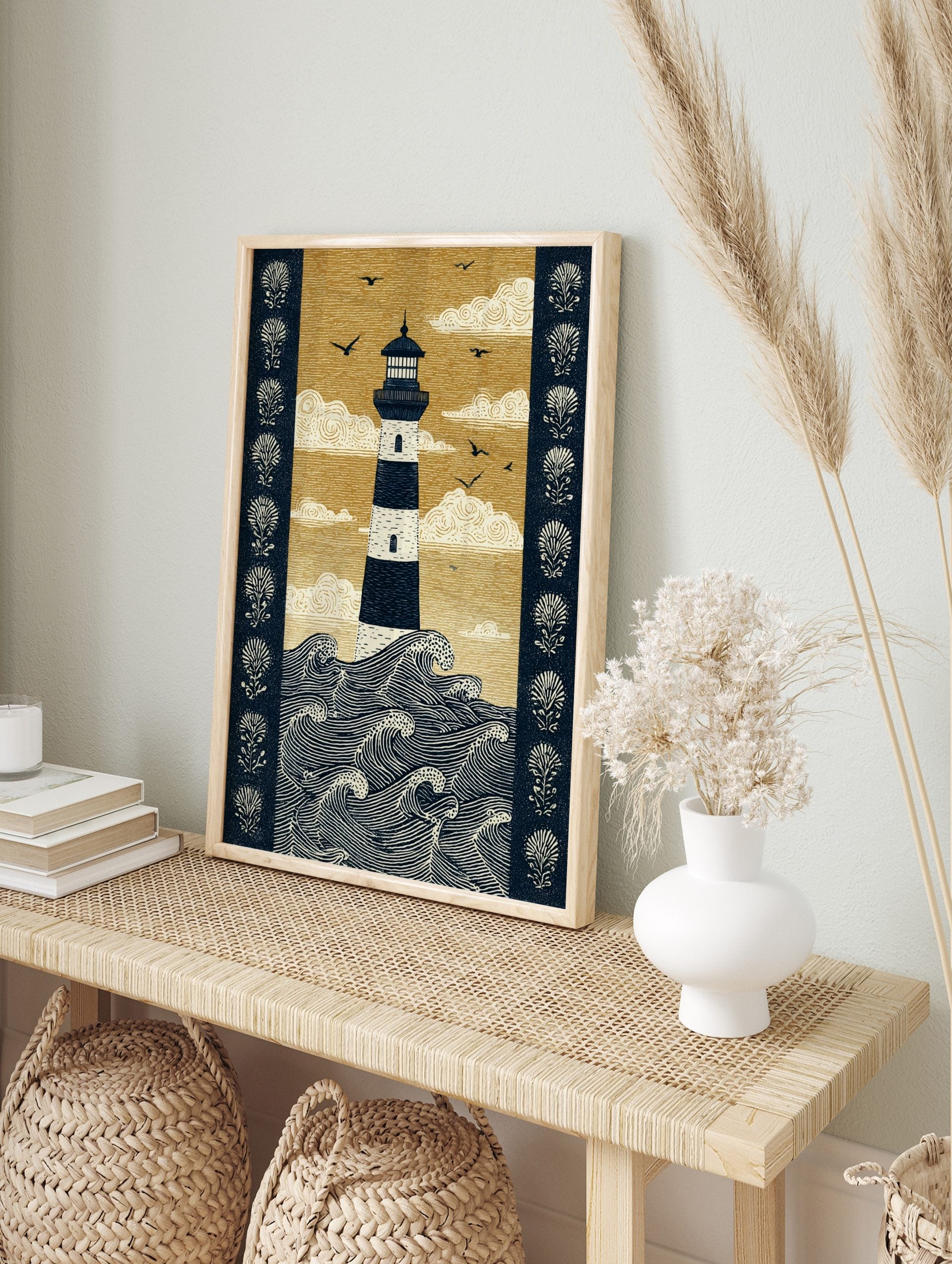 Illustrative print of a striped lighthouse in dark blue and golden-beige, with crashing, in an alternate framed mockup