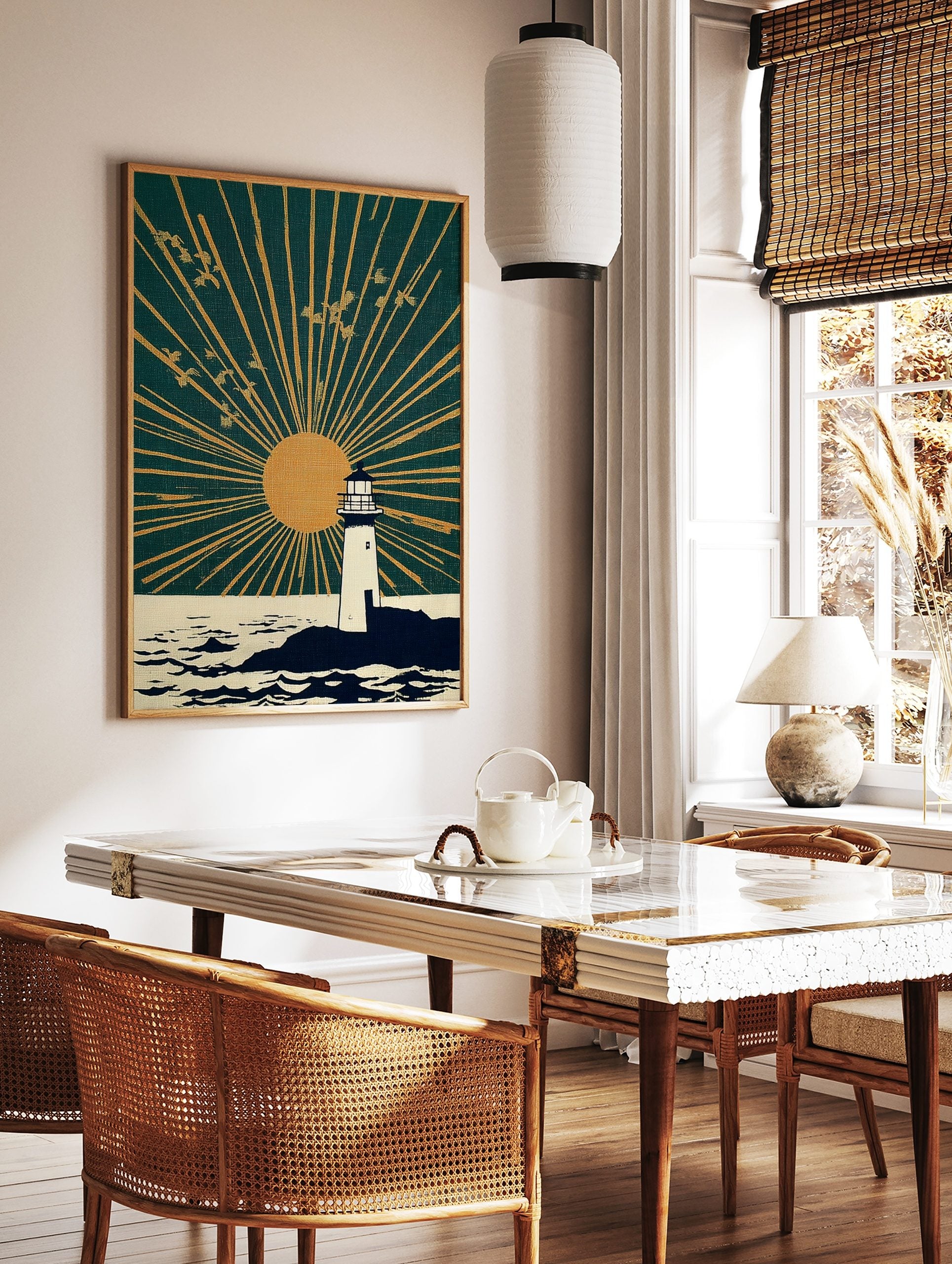 White lighthouse on rocky coast with golden sun and radiating rays in deep teal sky, birds flying, in a styled room mockup