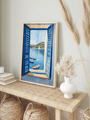 Coastal painting showing a sea view through blue open shutters, with boats in the water and hills in the background. - Image 4