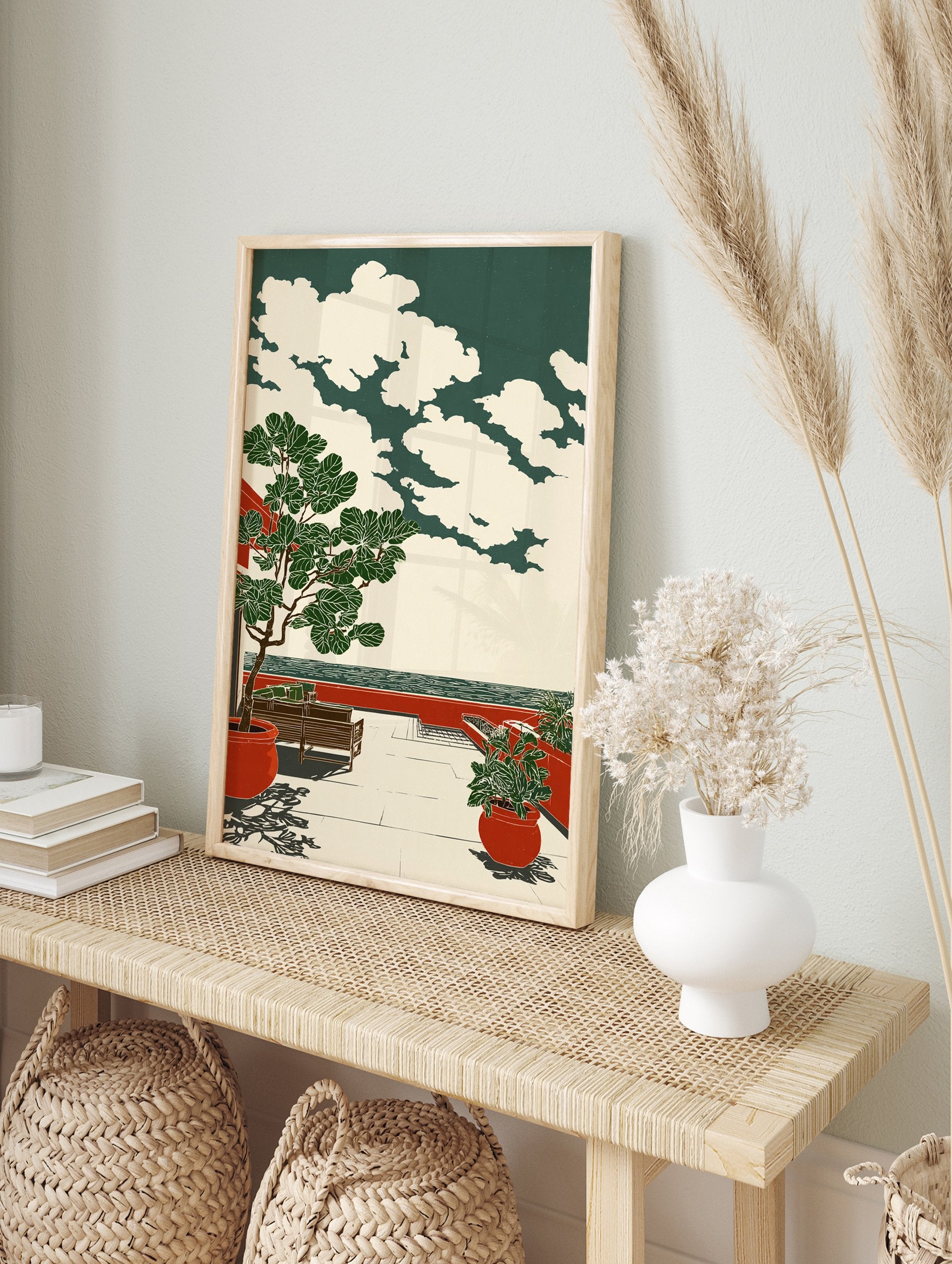 Illustrative coastal terrace print with a large fig tree in a red pot, a bench, and sea view under a cloudy sky. - Image 3