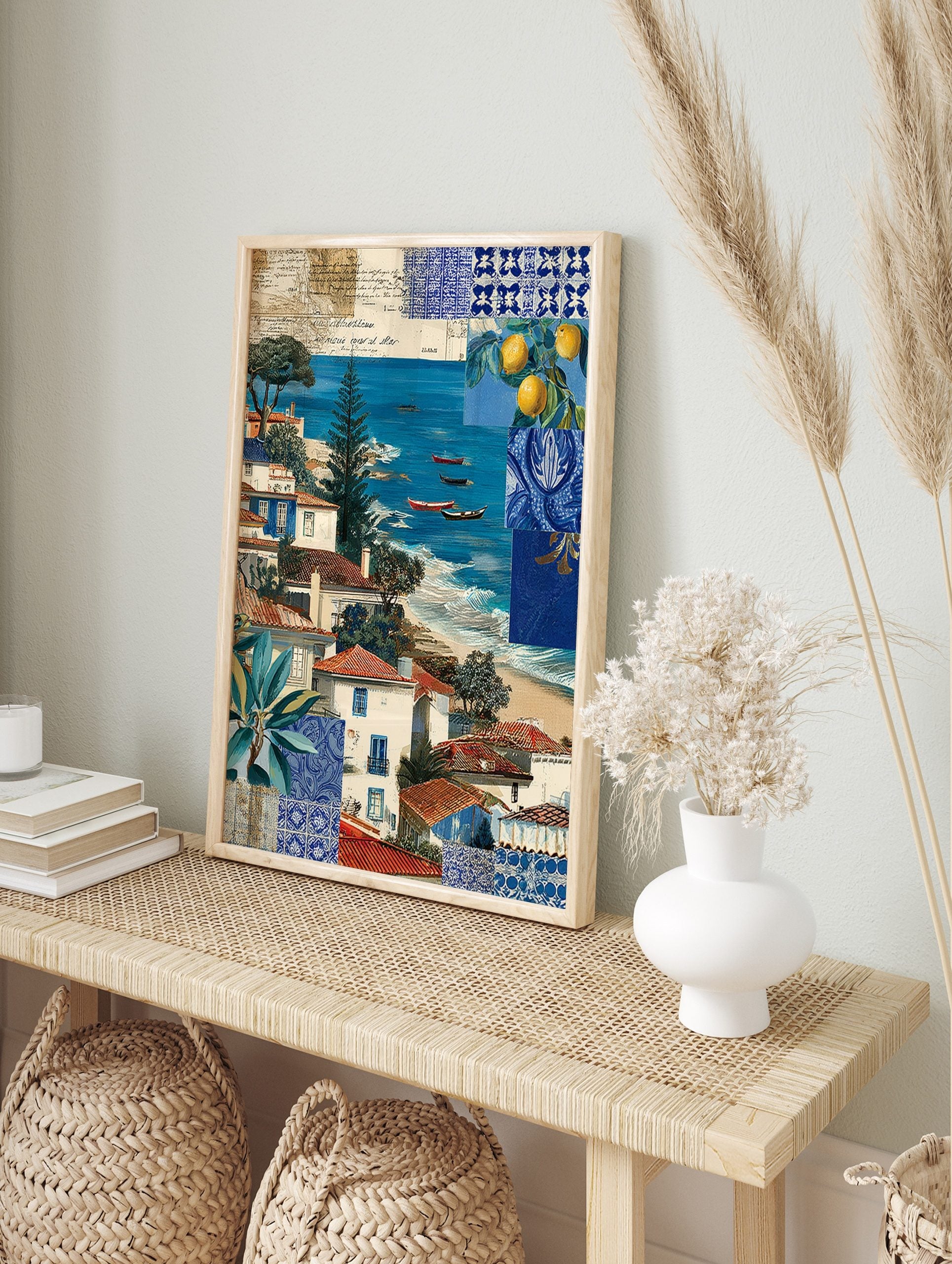 Coastal village scene with white and blue houses, red roofs, blue sea, boats, and blue tile, in an alternate framed mockup
