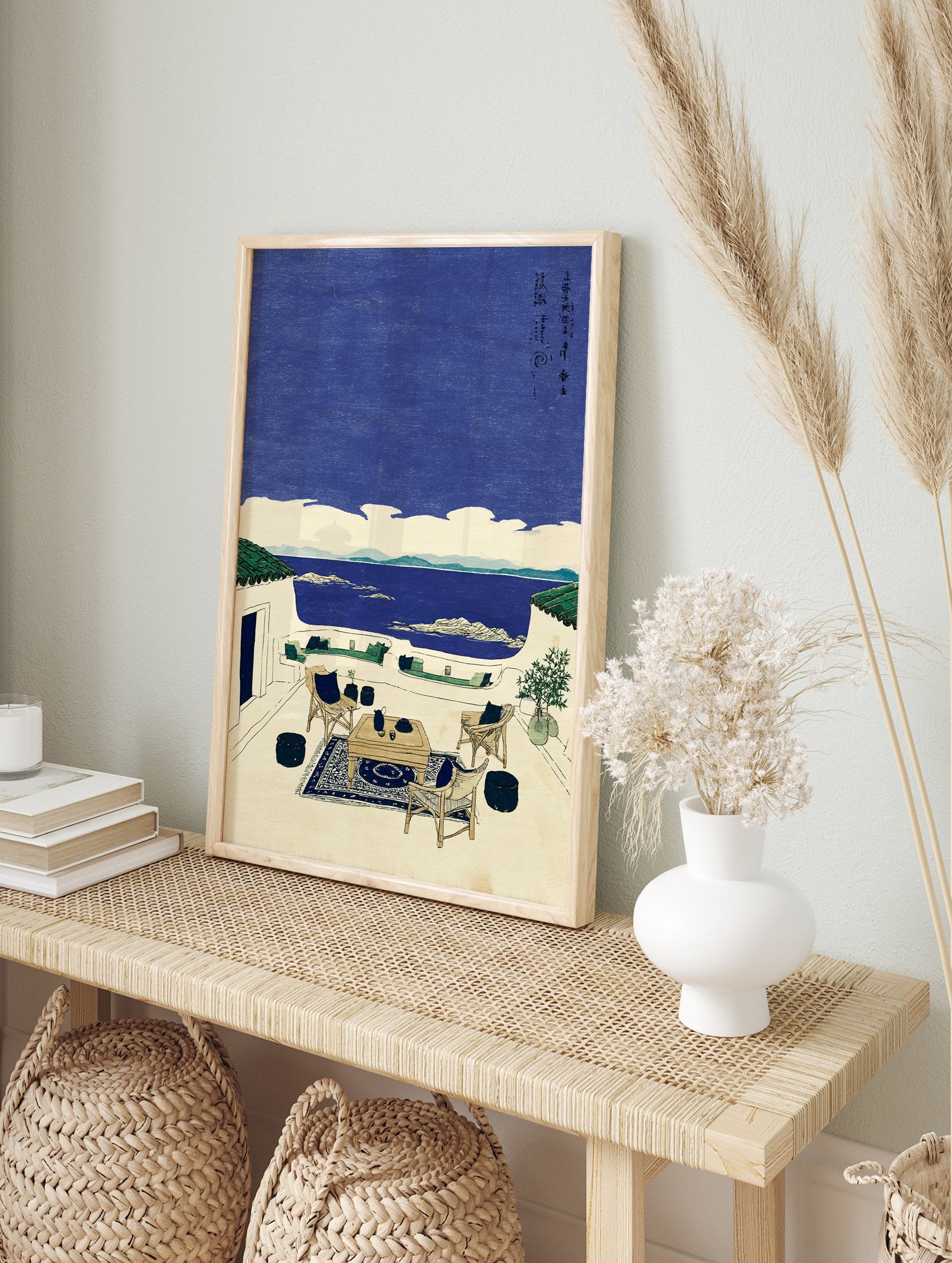 Coastal wall art showing a Japanese-inspired terrace overlooking a blue sea with islands, featuring a table, chairs, and plants. - Image 3