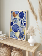 Blue and white coastal wall art featuring various seashells, a spiral shell, and coral on a light background. - Image 3