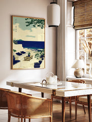 Coastal wall art illustration of a serene ocean view patio with white architecture, green plants, and a deep blue sea. - Image 2
