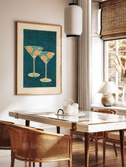 Illustrative cocktail wall art featuring two martini glasses with orange slices on a dark teal dotted background. - Image 3