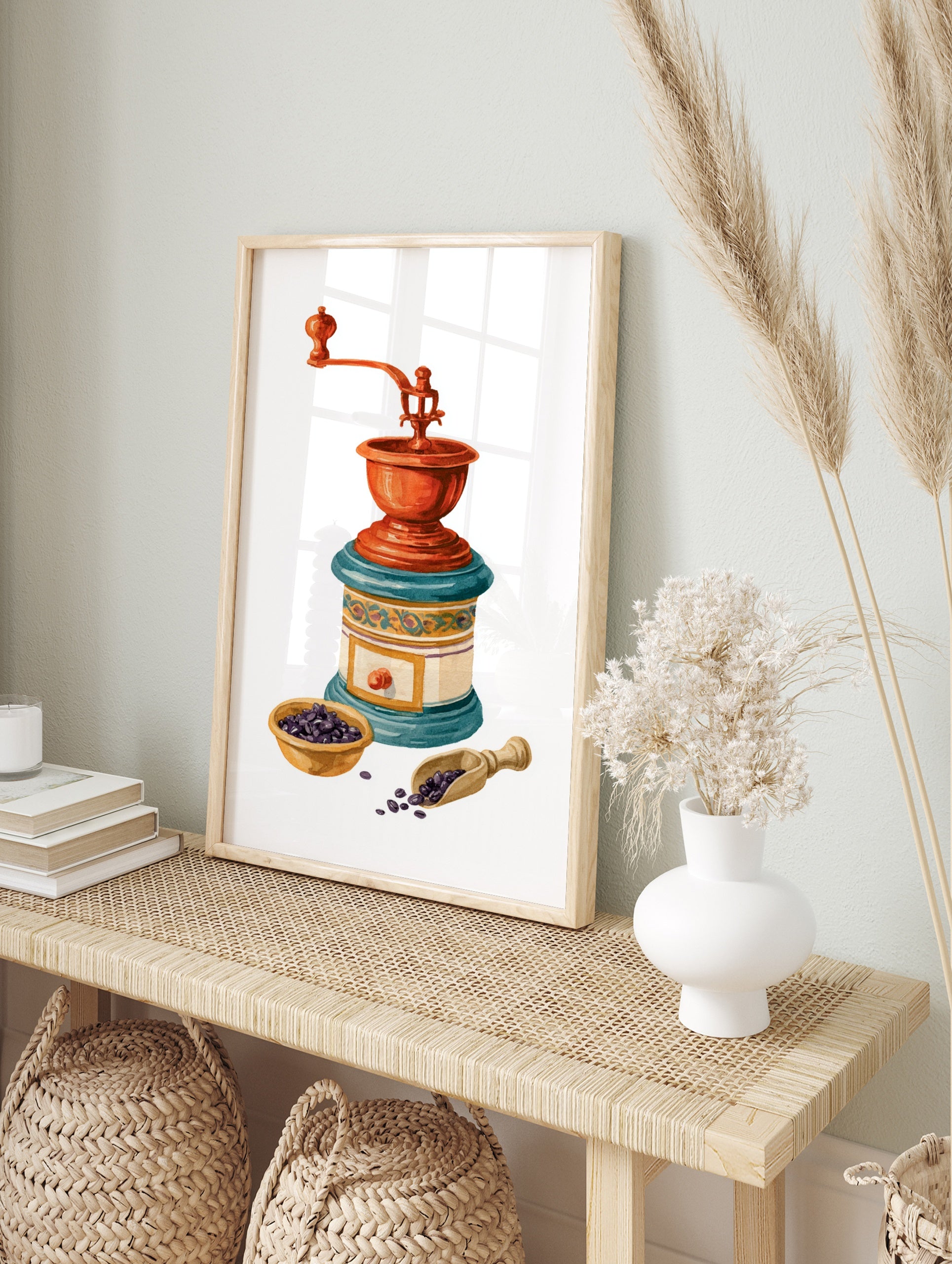 Watercolour illustration of a vintage coffee grinder with copper top and blue base, with, in an alternate framed mockup