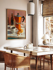 Coffee poster featuring an orange moka pot, a white cup of black coffee, and a croissant on a white table with a pink wall background. - Image 2