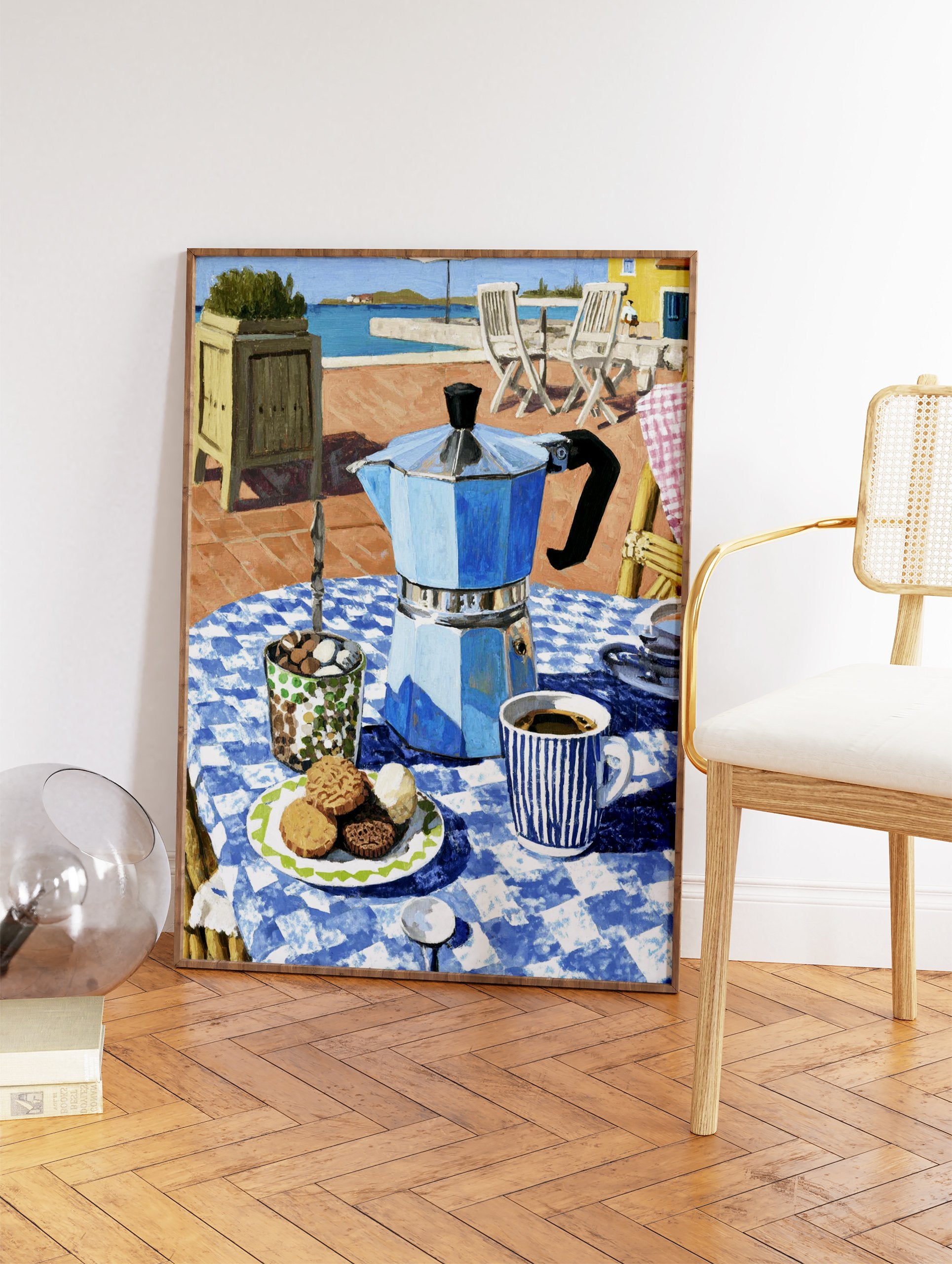 Coffee Terrace Art print with a blue moka pot, coffee cup, and cookies on a checkered table by the Mediterranean sea. - Image 2