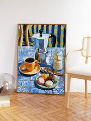 Coffee Wall Art featuring a Moka pot, orange coffee cup, macarons, and chocolate cake on a blue and white tiled table. - Image 2