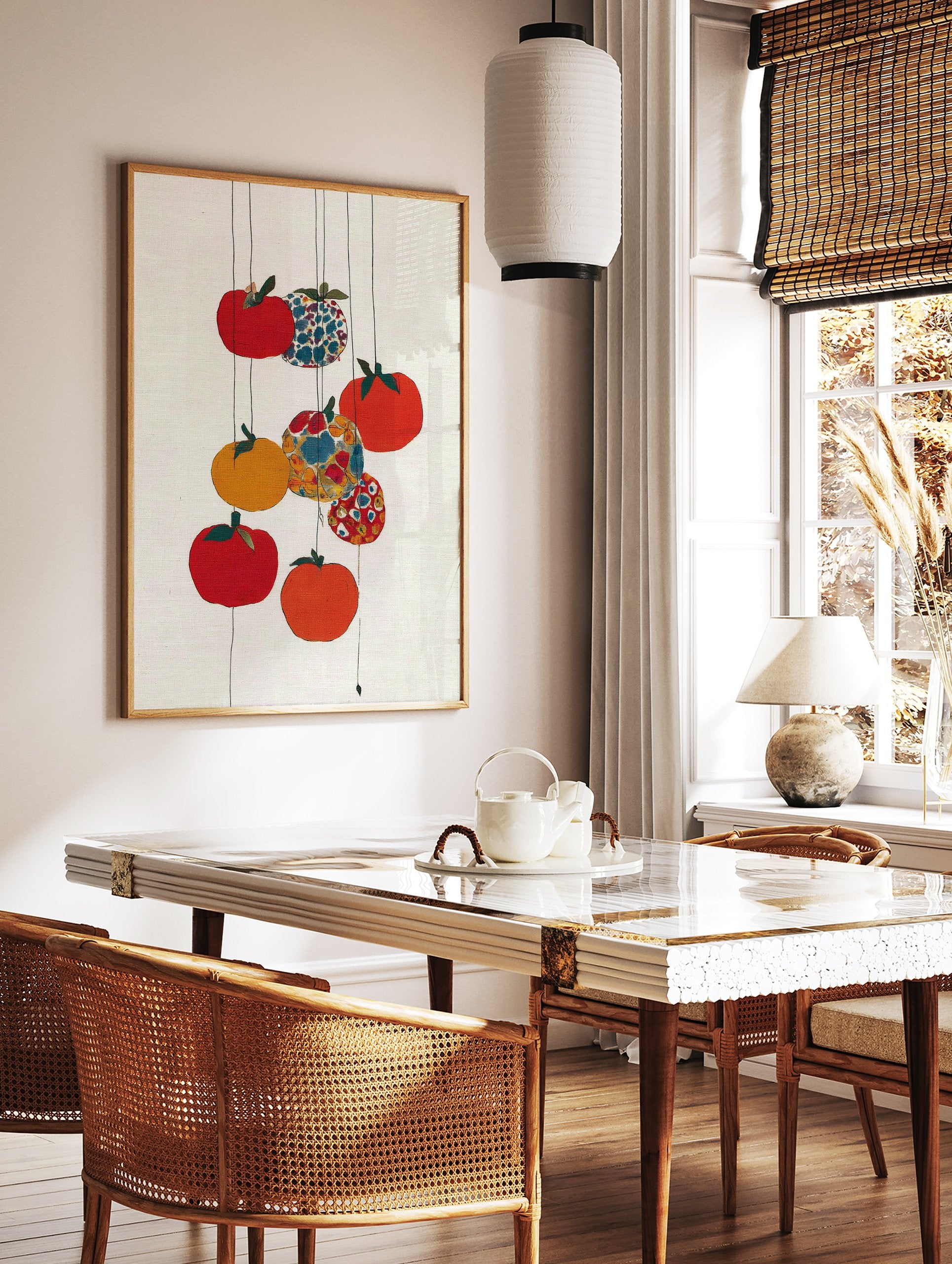 Colorful fruit wall art with red, orange, yellow, and patterned fruits hanging on thin lines against a white textured background. - Image 3