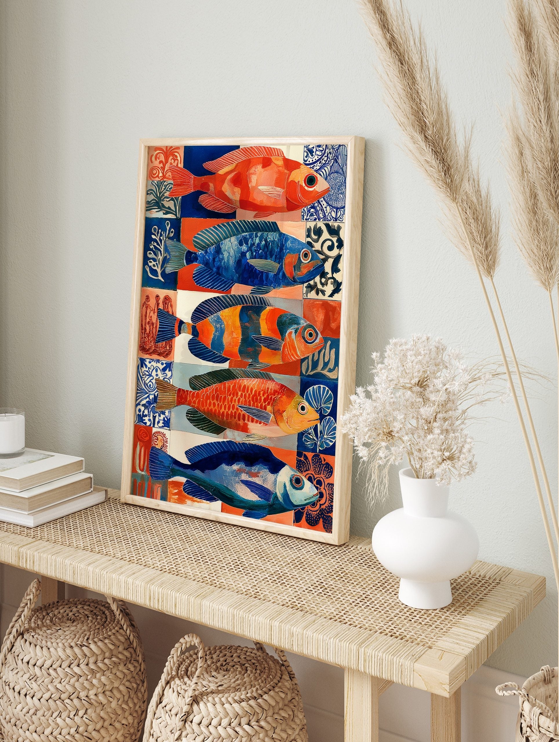 Five colourful illustrative fish in blue and orange hues against patterned tiles, marine life, in an alternate framed mockup