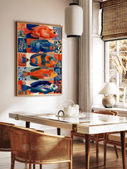 Five colourful illustrative fish in blue and orange hues against patterned tiles, marine life wall, in a styled room mockup