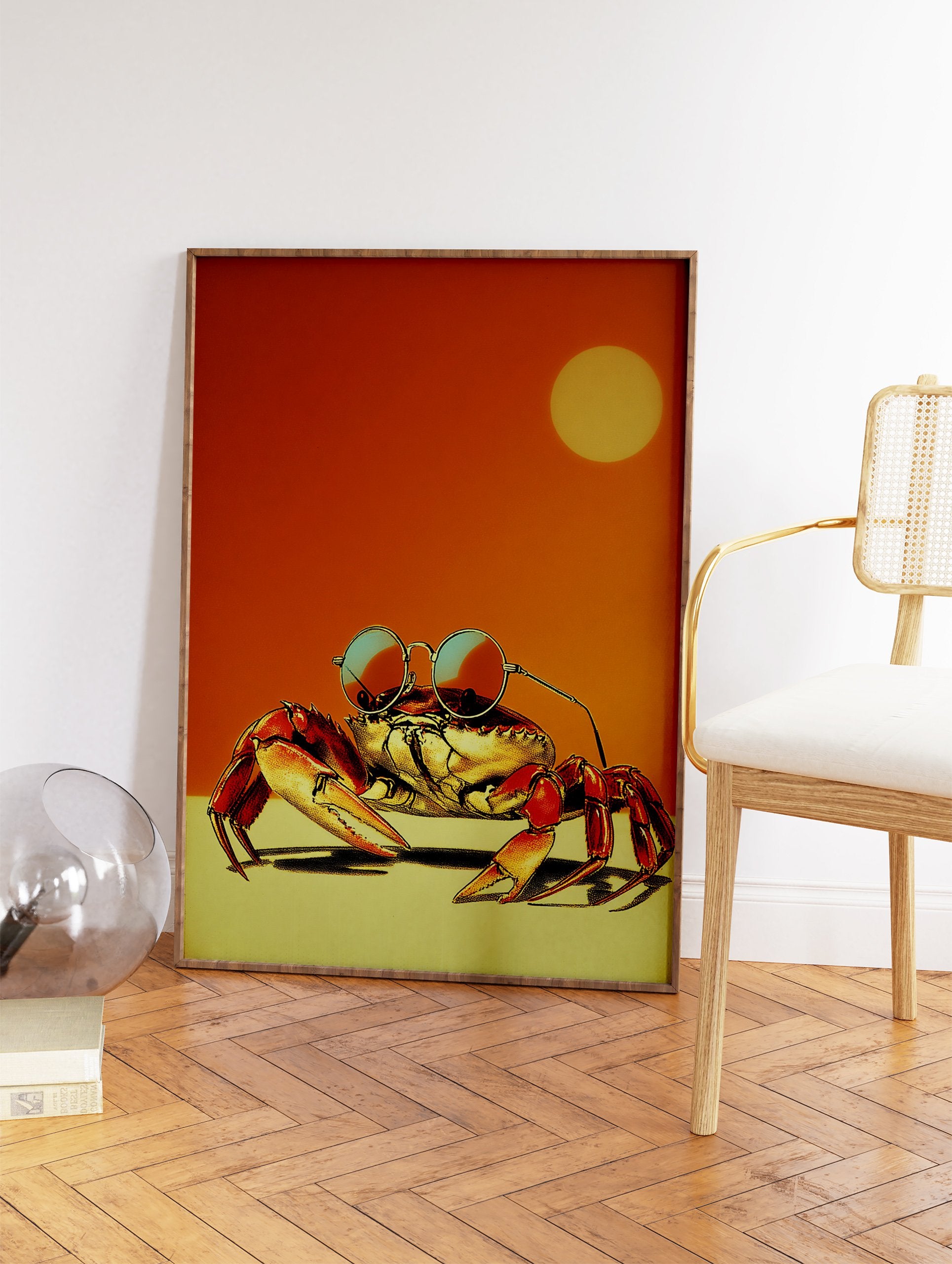 Retro illustration of a cool crab wearing round sunglasses with an orange sky and yellow sun in the background. - Image 2