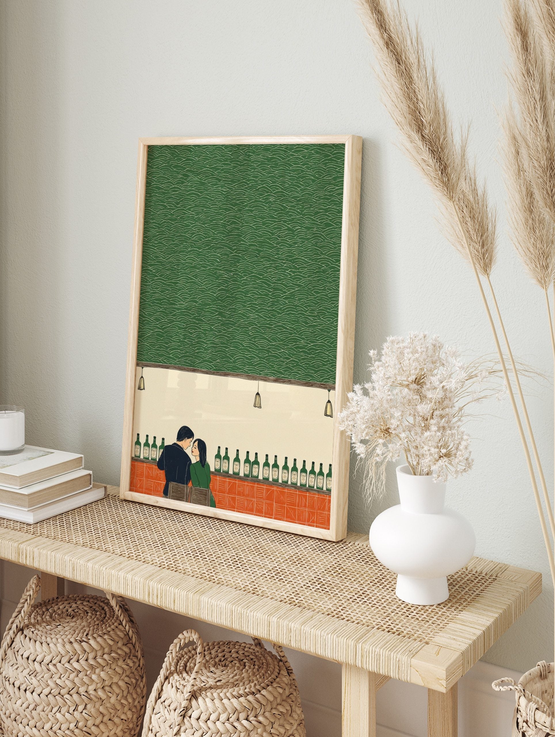 Illustrative print of a couple at a bar with green bottles and a textured green wall, in an alternate framed mockup
